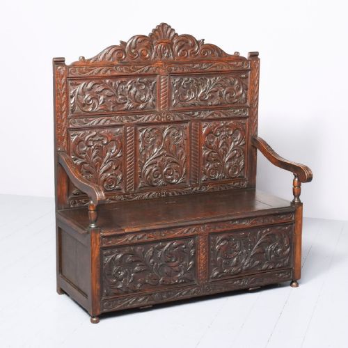 A Large Victorian Carved Oak Hall Bench