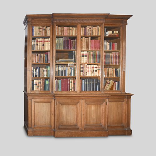 CARVED OAK 4 DOOR BOOKCASE