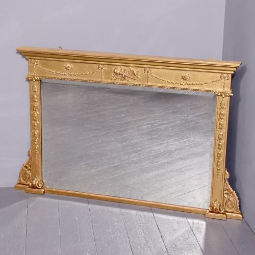 Neat Size Regency Gilded Overmantel Mirror with Neoclassical Decoration
