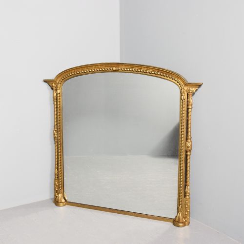 EXCEPTIONAL GILTWOOD REGENCY OVERMANTEL MIRROR WITH GILDING AND MIRROR PLATE