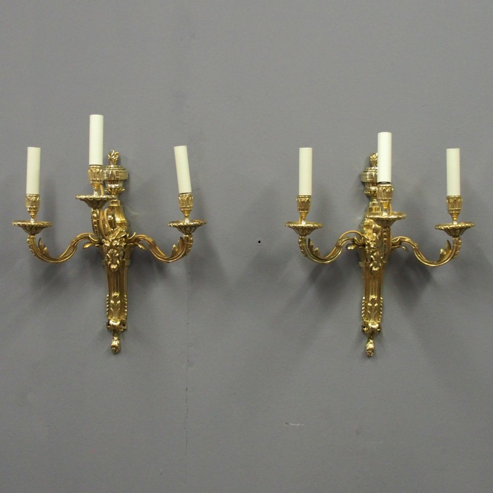 Pair of Adams Style Cast Brass and Gilded Wall Sconces