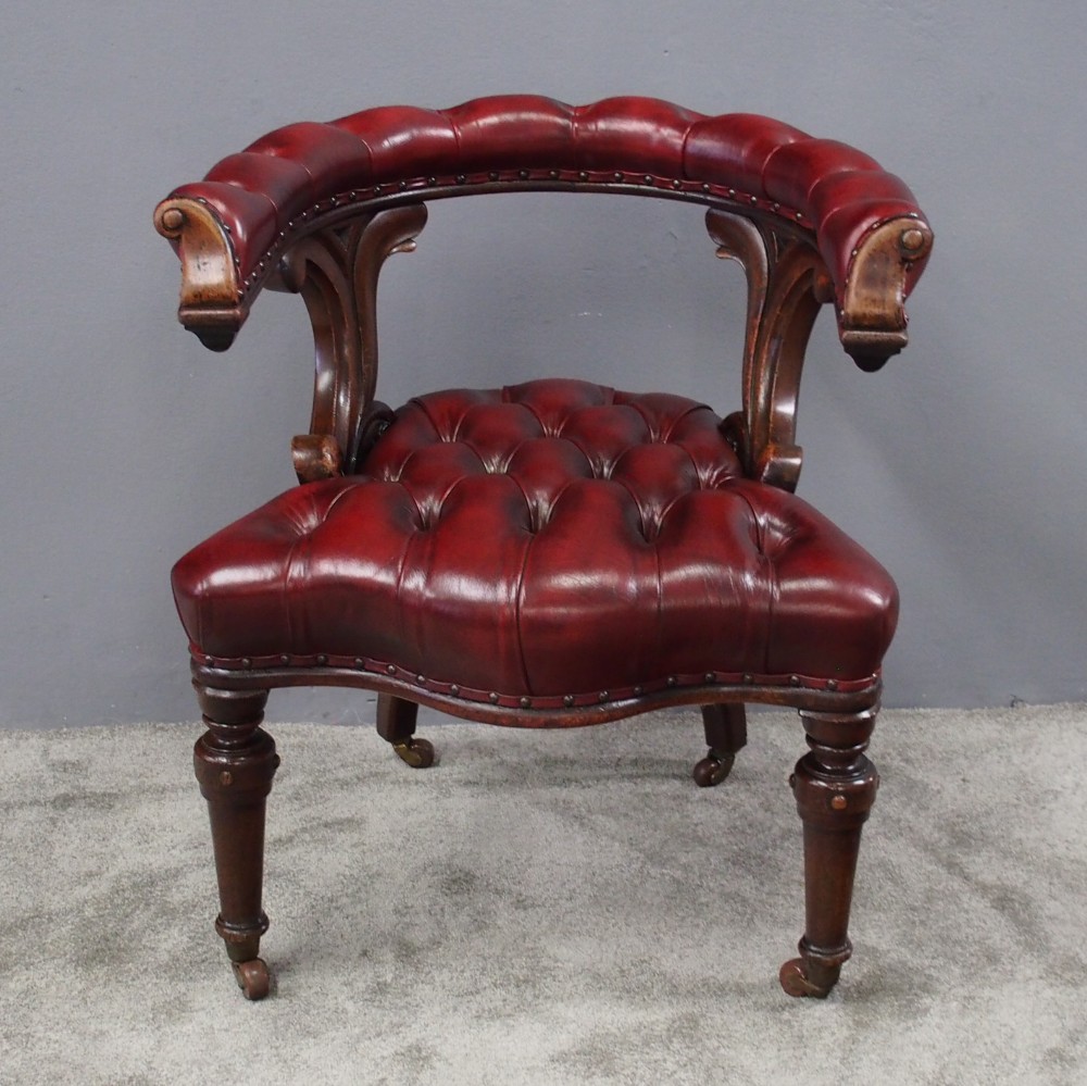 Oak and Burgundy Leather Horseshoe Captains Chair