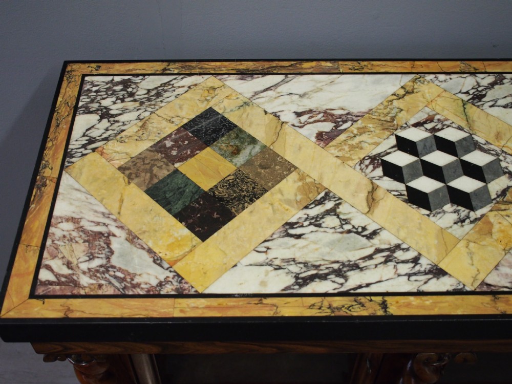 A dark William IV rosewood side cabinet featuring a geometric specimen marble top, barley twist support columns, and two glass door panels. View VII