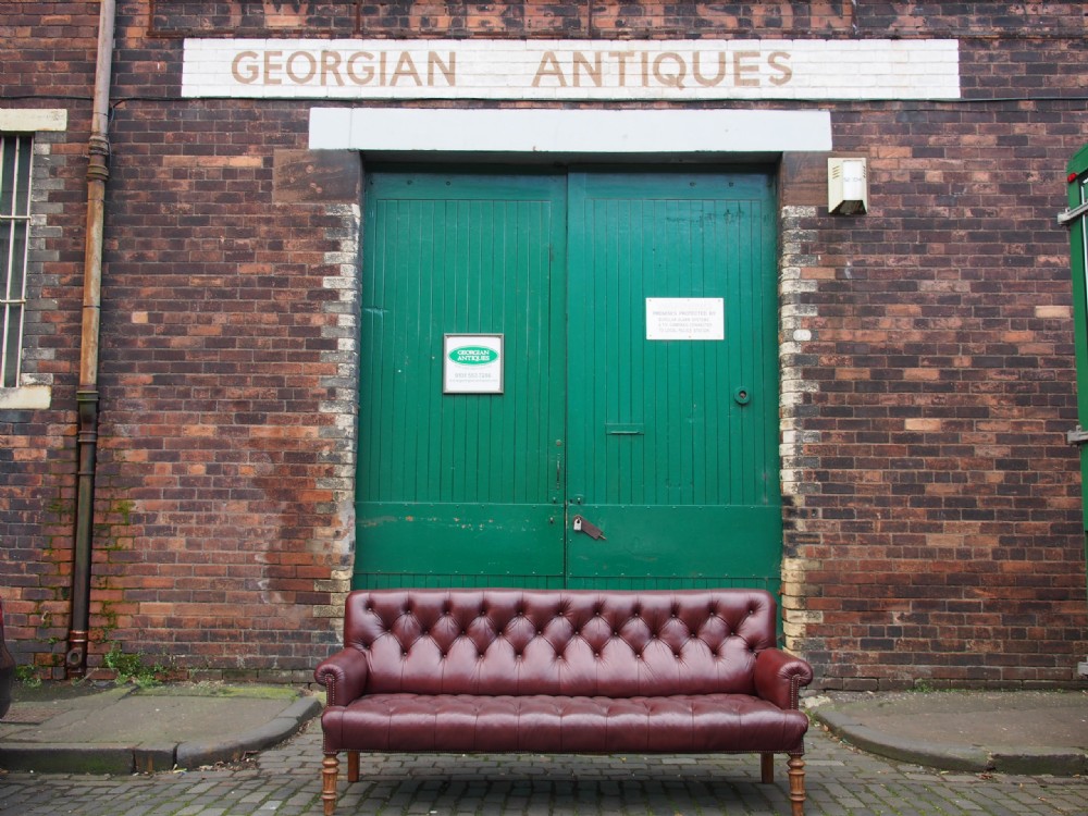 Burgundy Leather and Walnut Sofa By Gillows View II