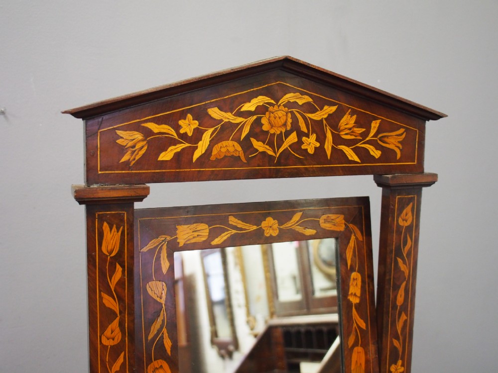 A Dutch marquetry toilet mirror with floral wood inlay, a pivoting rectangular frame, and a base featuring small drawers. View VI