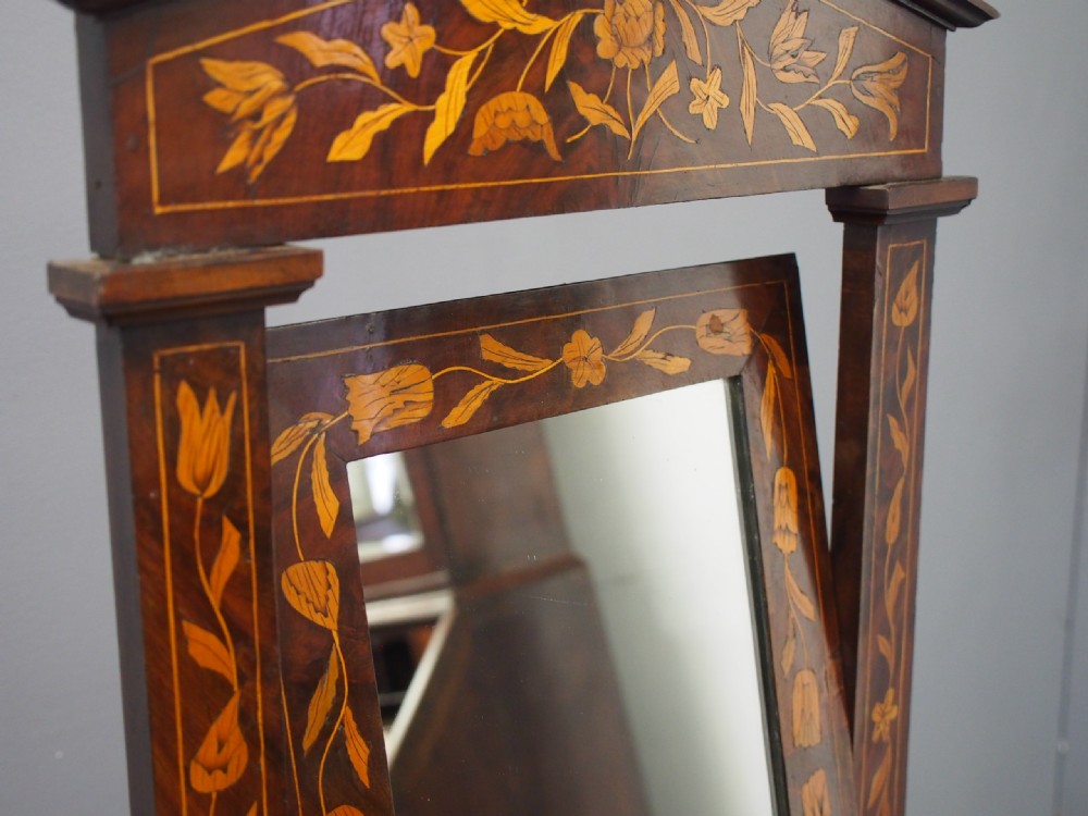 A Dutch marquetry toilet mirror with floral wood inlay, a pivoting rectangular frame, and a base featuring small drawers. View XIII