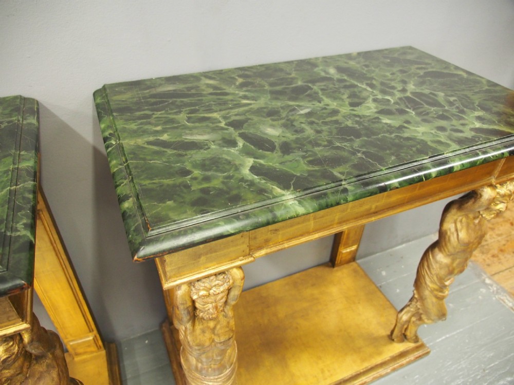 A pair of rectangular gilded console tables featuring carved mythological centaur figures supporting green marble tops. View XIII