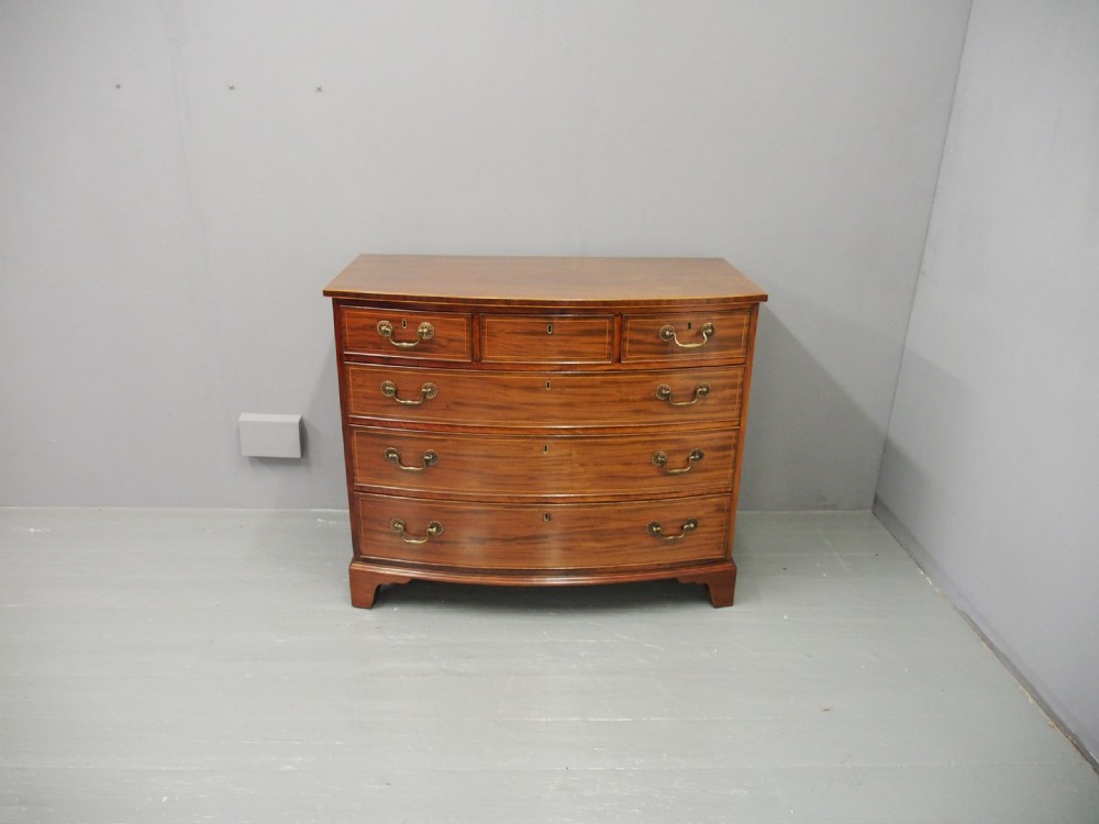 George III Inlaid Mahogany Bow-front Chest of Drawers View II