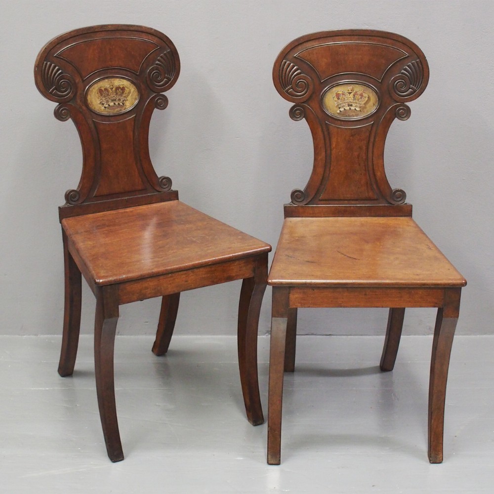 Pair of Regency Mahogany Hall Chairs with Painted Coronet