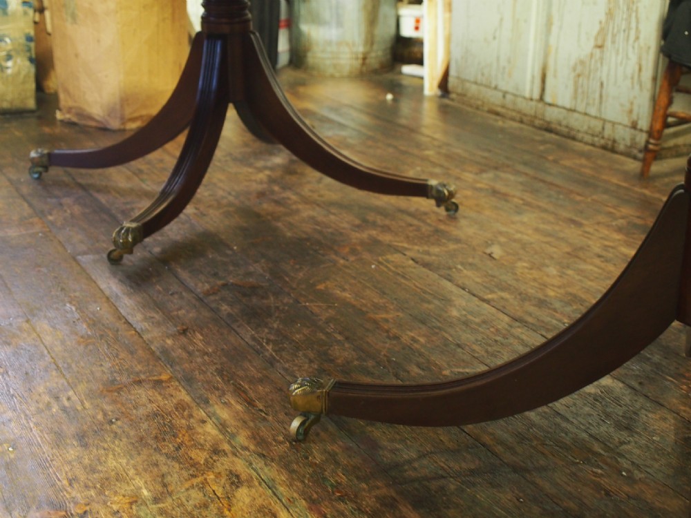 Regency Style Triple Pillar Mahogany and Rosewood Dining Table View IV
