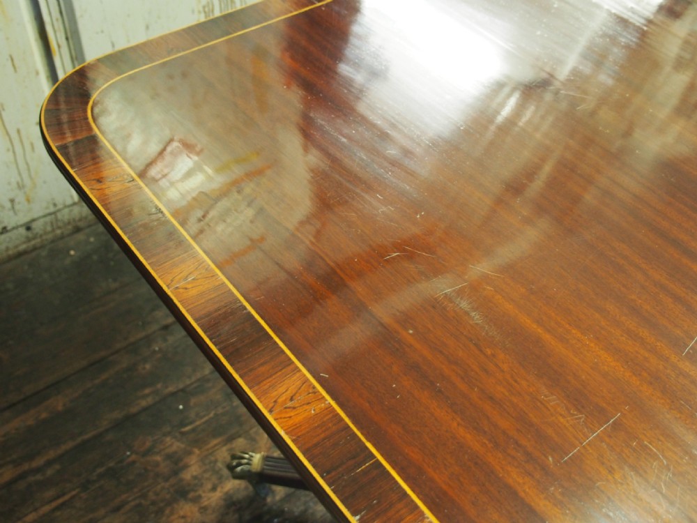 Regency Style Triple Pillar Mahogany and Rosewood Dining Table View XI
