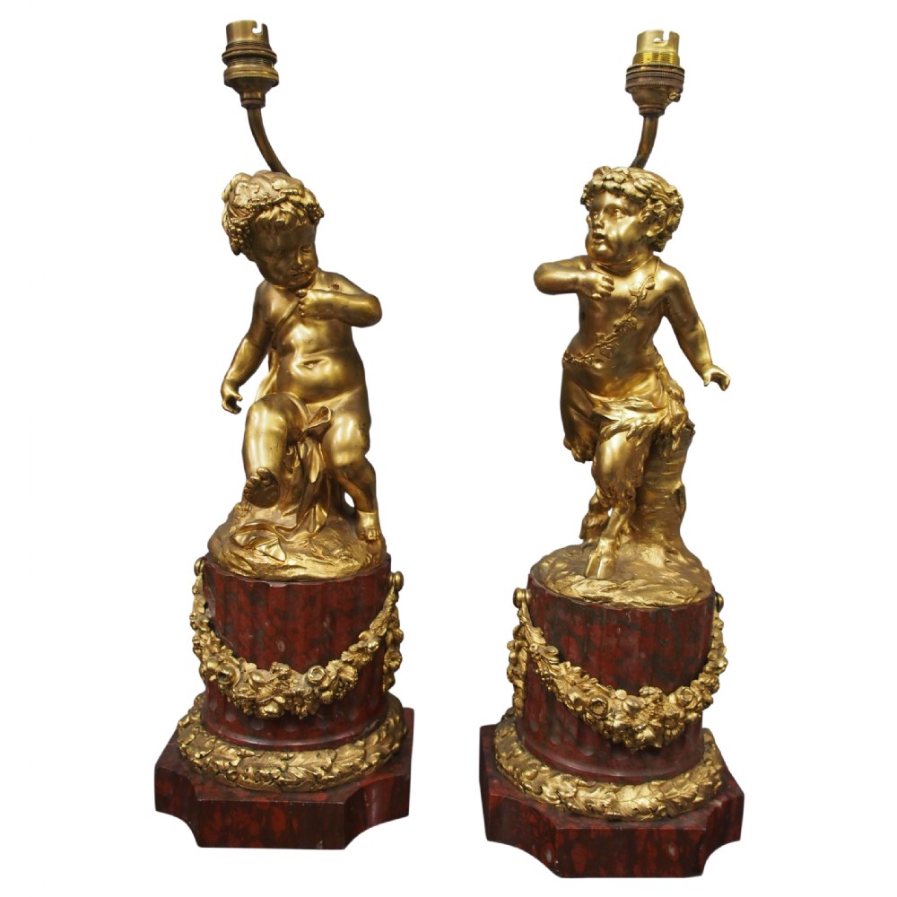 Pair of Gilt Bronze Lamps with Figures after Clodion