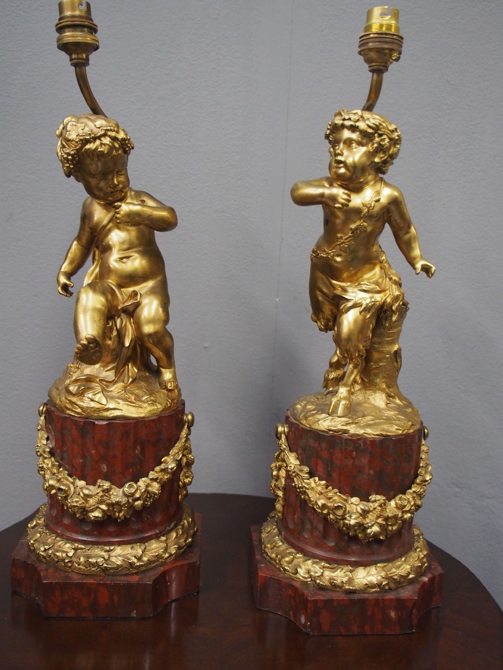 Pair of Gilt Bronze Lamps with Figures after Clodion View II