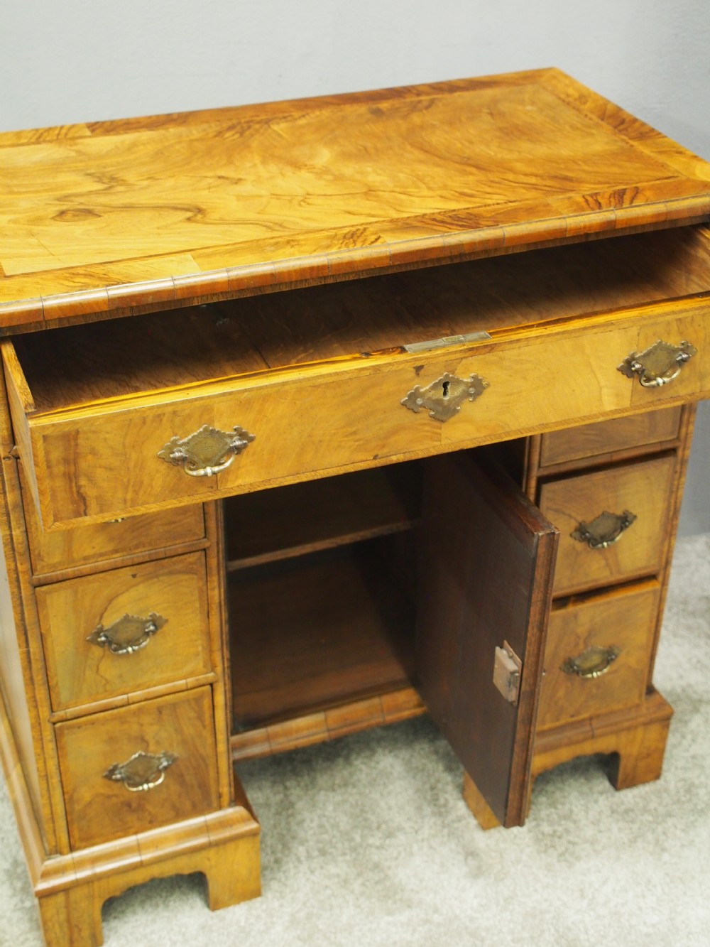Neat George II Style Walnut Kneehole Desk View X