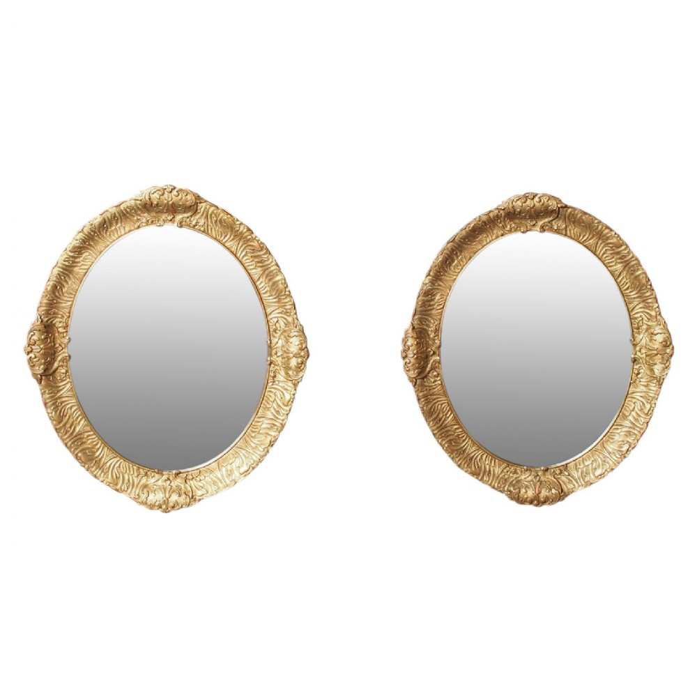 Victorian Pair of Carved Gesso and Gilded Oval Wall Mirrors