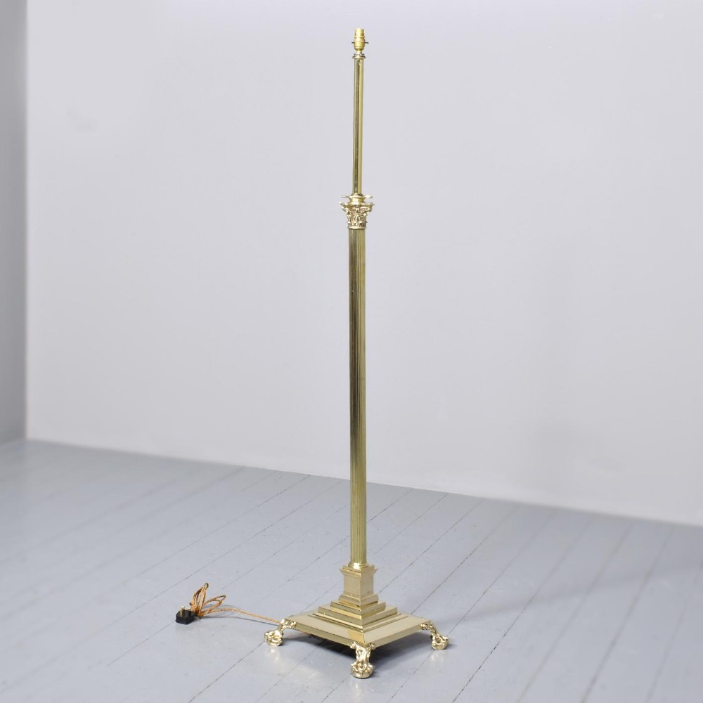 A Victorian Brass Corinthian Lamp