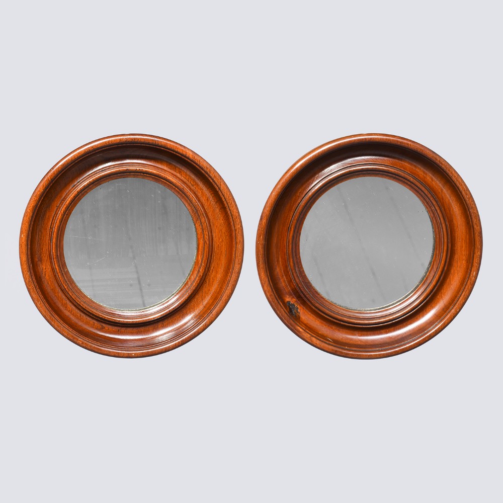 Pair of Circular Walnut Wall Mirrors