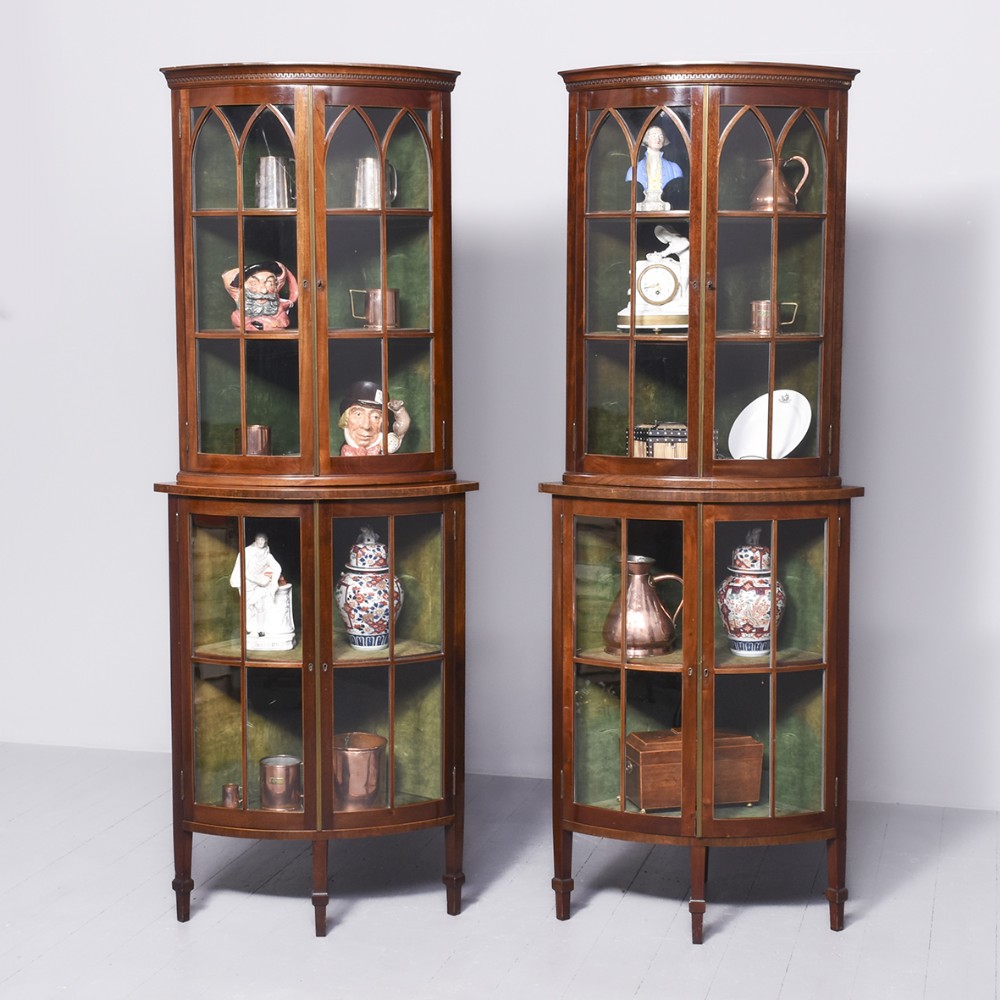 Pair of Tall Bow-Front Inlaid Mahogany Glazed Corner Cabinets
