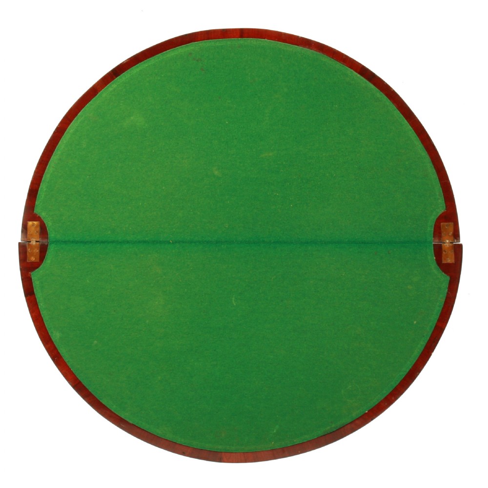 A semi-circular mahogany card table featuring floral marquetry inlay on the top and apron, supported by four square tapered legs. View VI