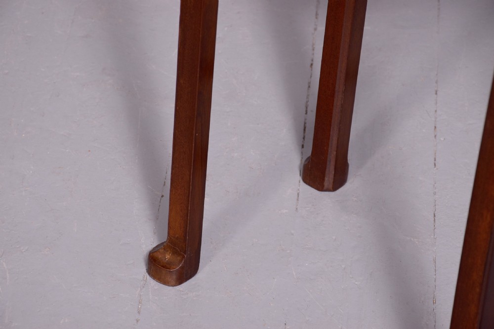A tall, narrow mahogany side table featuring four straight legs, a single drawer with a central brass ring pull, and a polished wood surface. View II