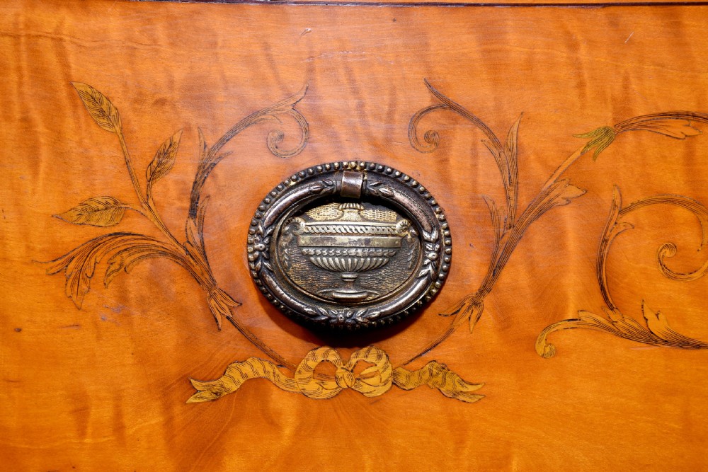 An antique satinwood secretaire bookcase featuring glazed upper doors with astragal tracery, detailed floral marquetry inlays, and an arched pediment. View X