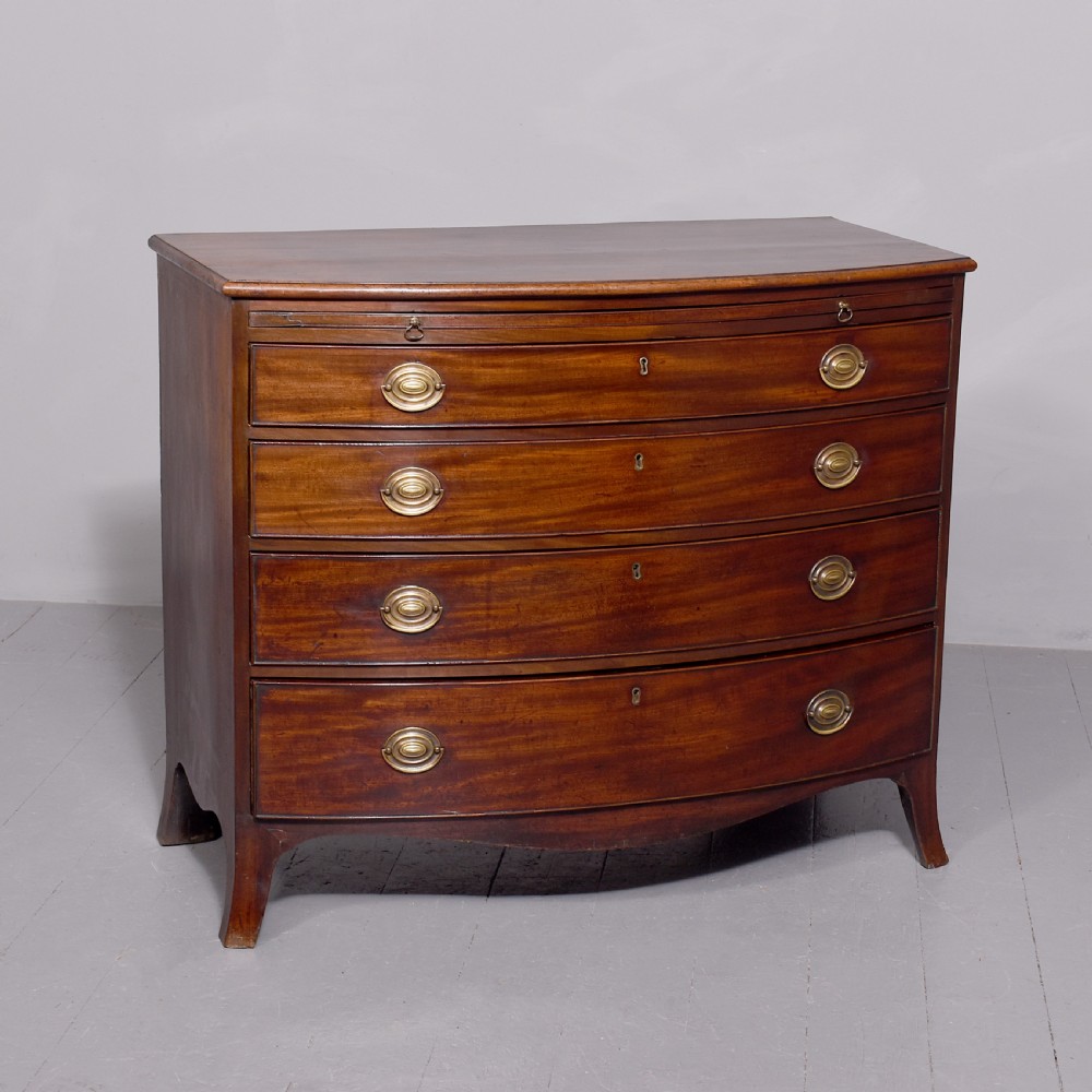 Neat size George 3rd mahogany bow - front chest of drawers with brushing slide and great colour and patina