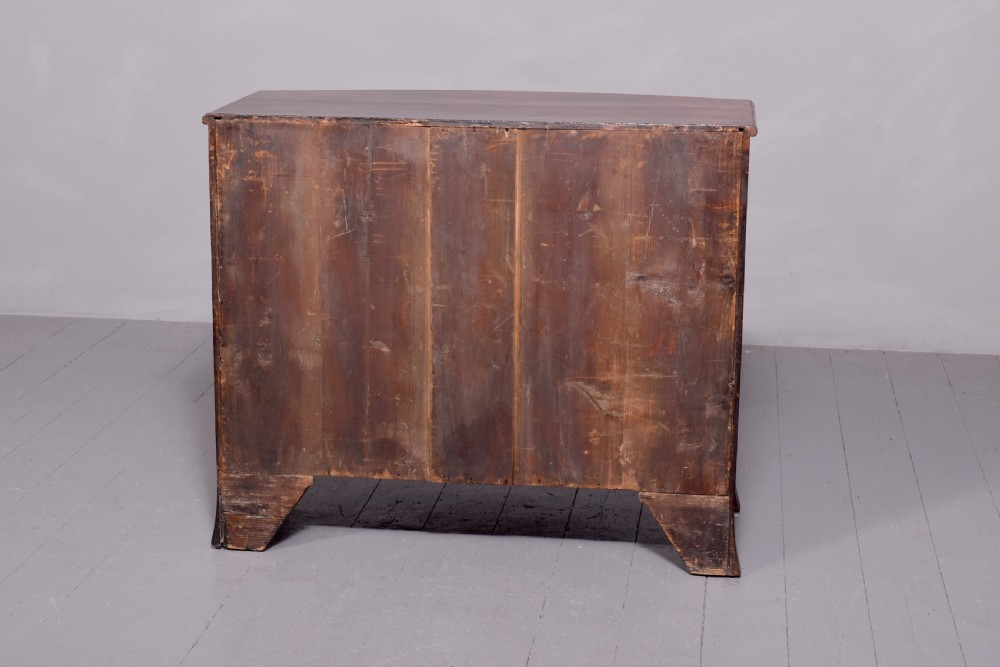 Neat size George 3rd mahogany bow - front chest of drawers with brushing slide and great colour and patina View II