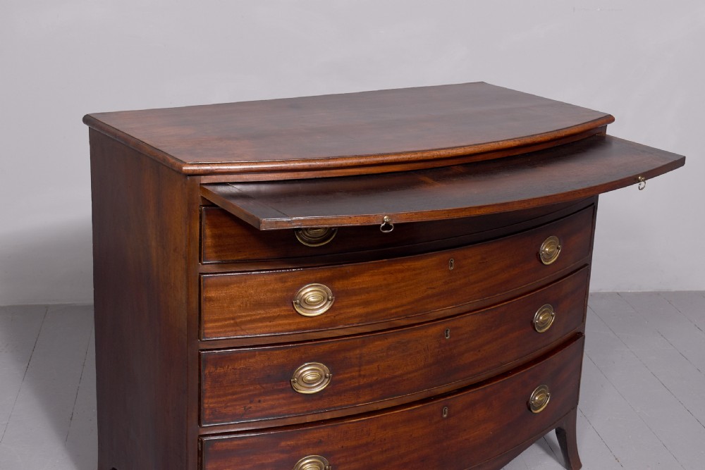 Neat size George 3rd mahogany bow - front chest of drawers with brushing slide and great colour and patina View VII