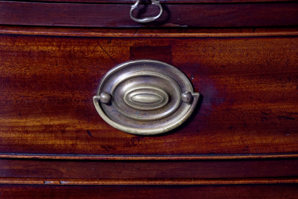 Neat size George 3rd mahogany bow - front chest of drawers with brushing slide and great colour and patina View X