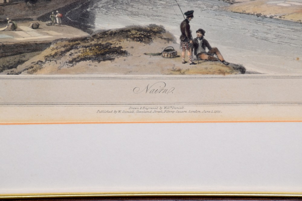 A row of six framed antique Regency landscape prints featuring topographical scenes framed in brown wood with cream mounts. View IV
