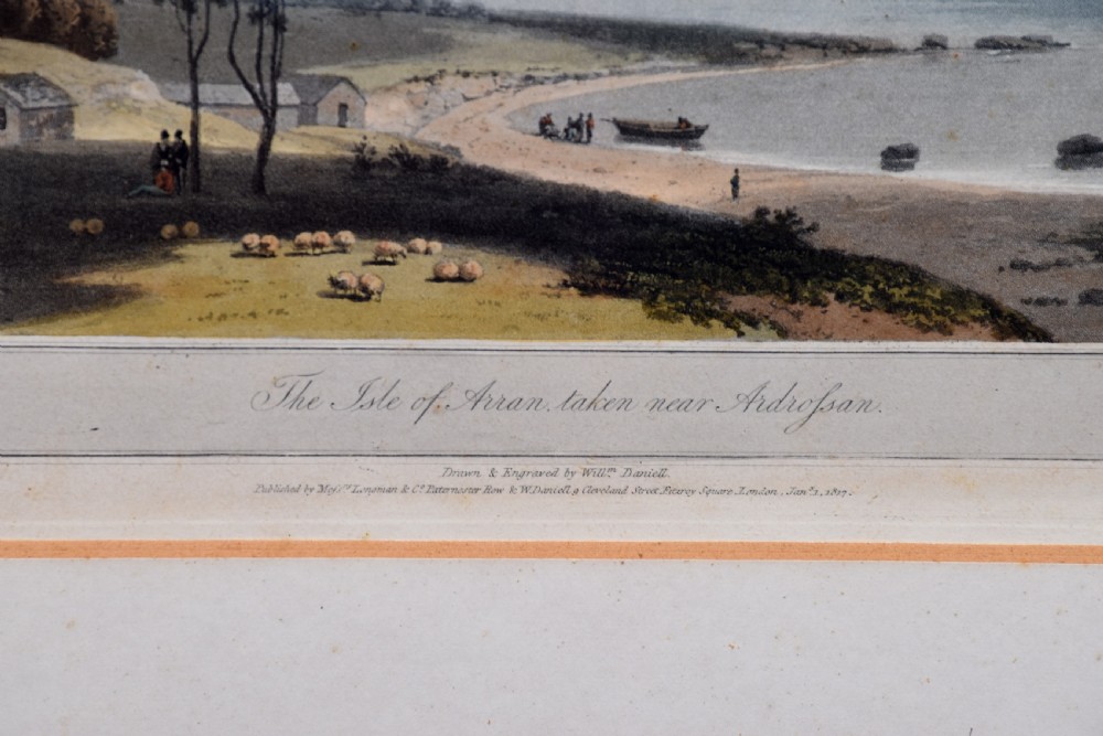A row of six framed antique Regency landscape prints featuring topographical scenes framed in brown wood with cream mounts. View V