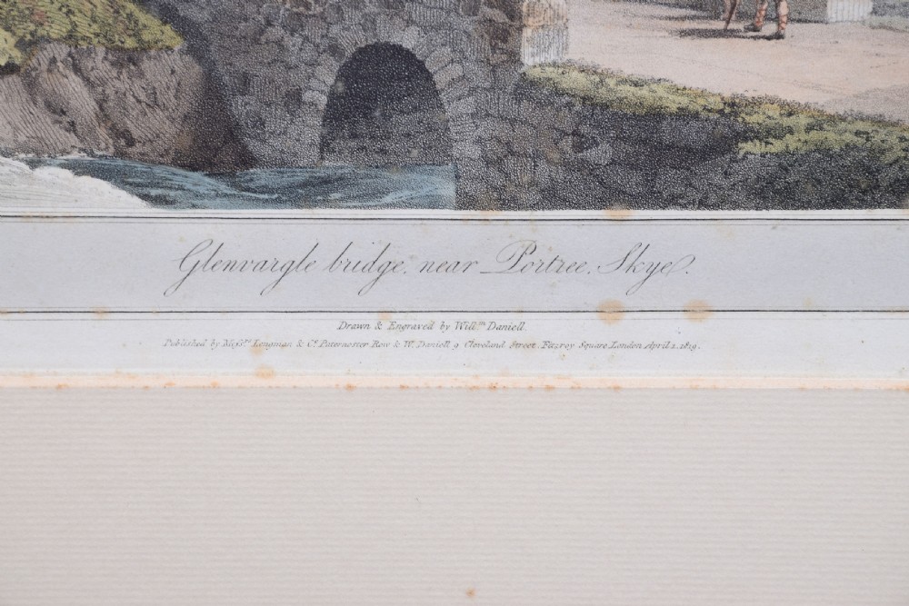 A row of six framed antique Regency landscape prints featuring topographical scenes framed in brown wood with cream mounts. View VIII
