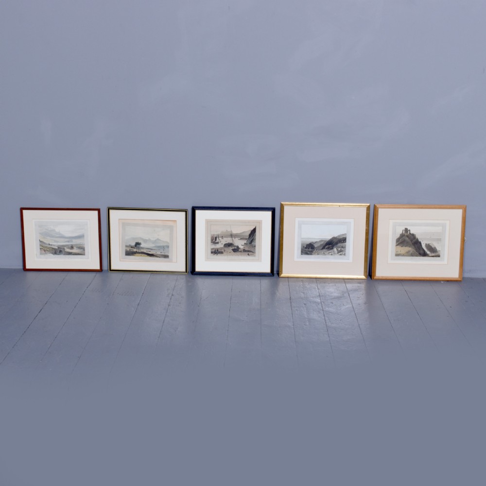 A row of six framed antique Regency landscape prints featuring topographical scenes framed in brown wood with cream mounts. View XVI