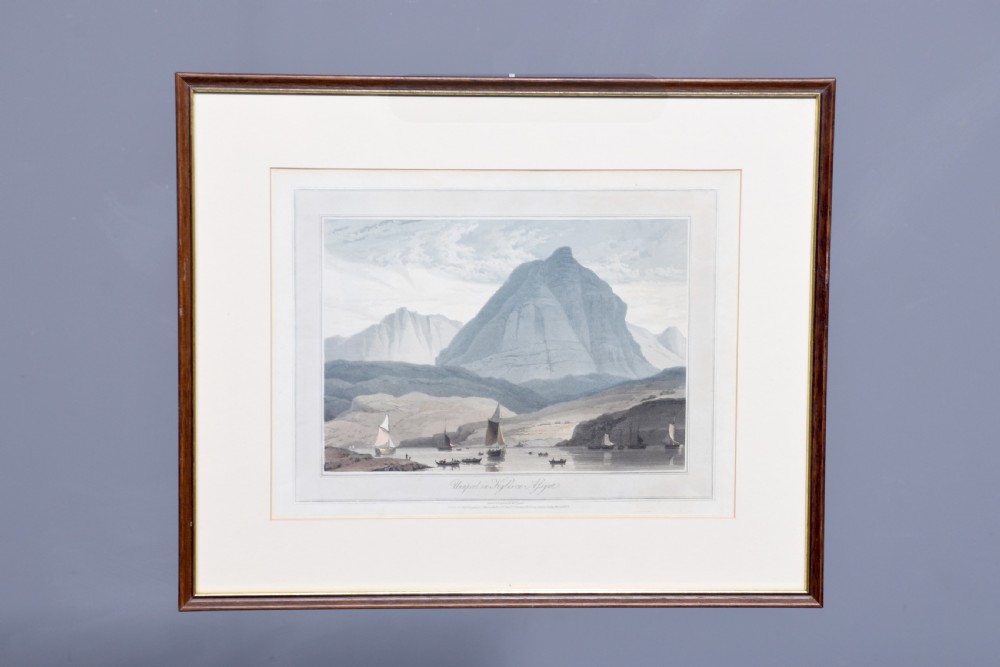 A row of six framed antique Regency landscape prints featuring topographical scenes framed in brown wood with cream mounts. View XXI