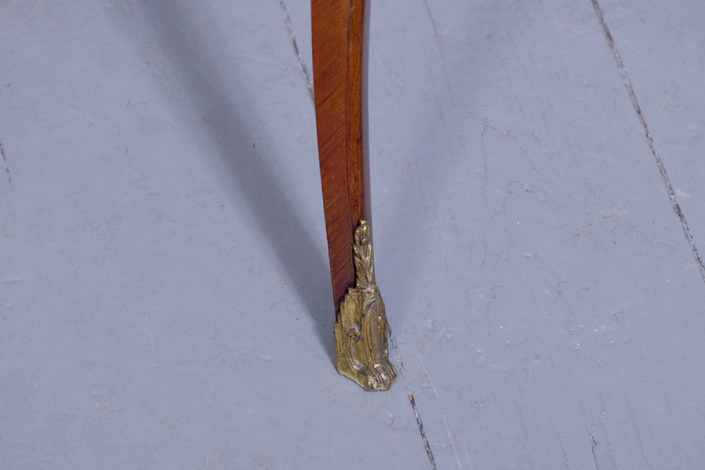 A Louis XV style French fold-over card table featuring warm brown veneer with floral marquetry inlay, cabriole legs, and gilt-bronze mounts. View XII