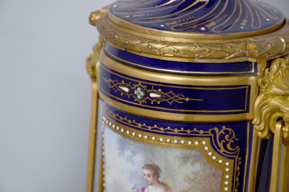 Pair of Sevres or Sevres style hand - decorated cobalt blue porcelain vases with ormolu mounts View VIII