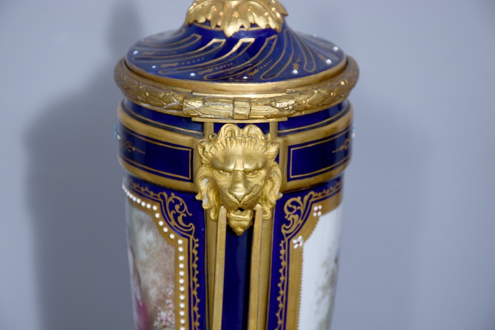 Pair of Sevres or Sevres style hand - decorated cobalt blue porcelain vases with ormolu mounts View X