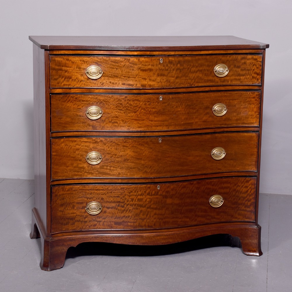 19 th Century mahogany serpentine - front Chest of Drawers in excellent condition