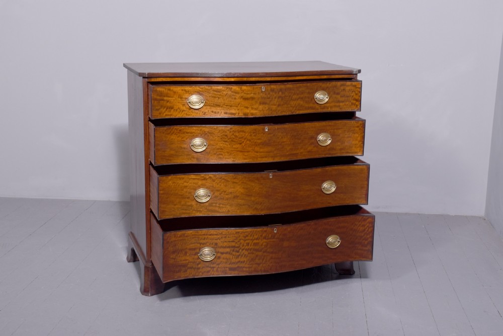 19 th Century mahogany serpentine - front Chest of Drawers in excellent condition View III