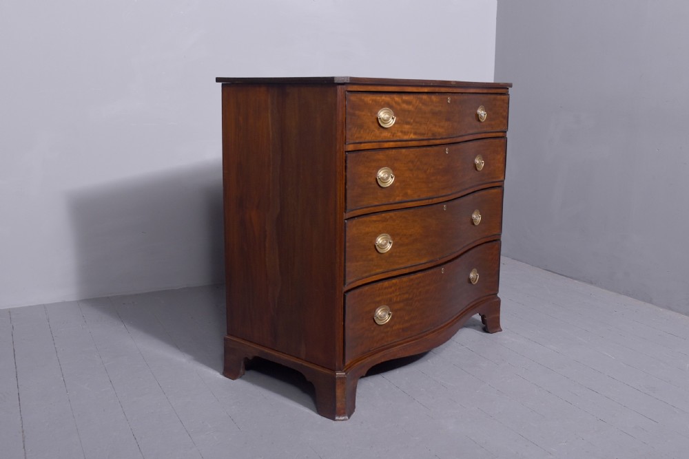 19 th Century mahogany serpentine - front Chest of Drawers in excellent condition View V