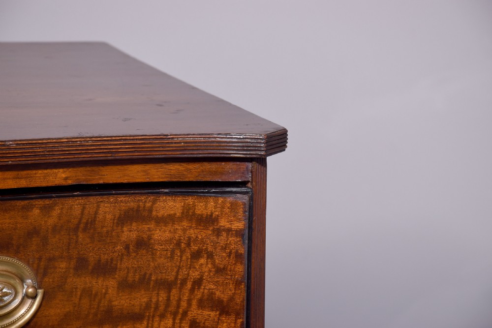 19 th Century mahogany serpentine - front Chest of Drawers in excellent condition View VI