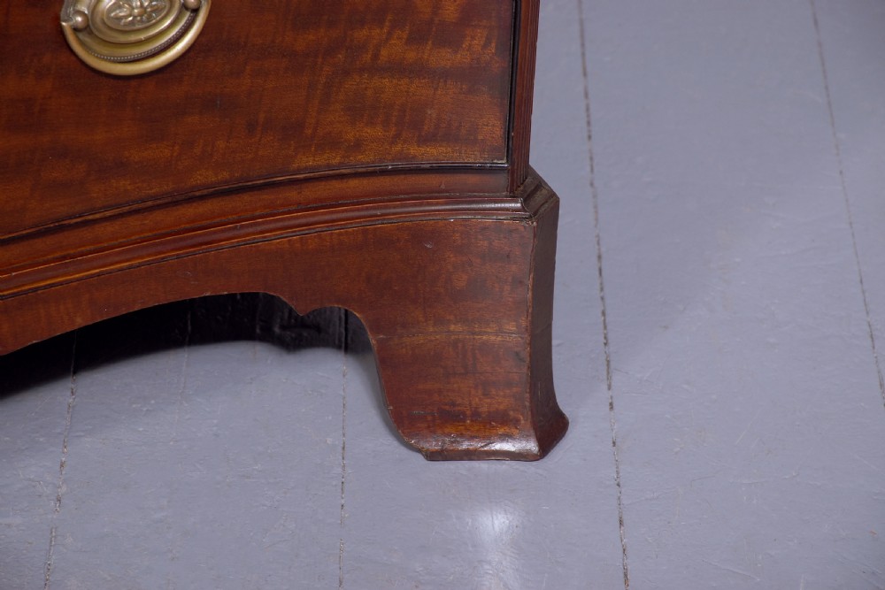 19 th Century mahogany serpentine - front Chest of Drawers in excellent condition View VII