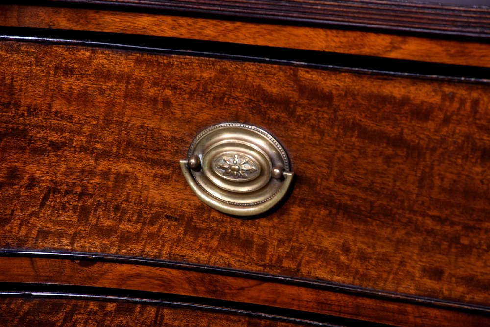 19 th Century mahogany serpentine - front Chest of Drawers in excellent condition View VIII