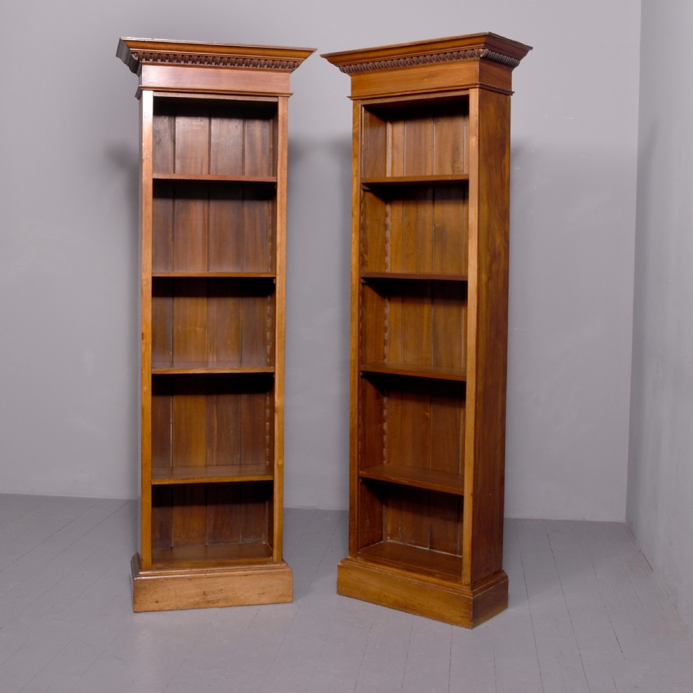 Pair of Victorian tall mahogany open bookcases with adjustable shelves
