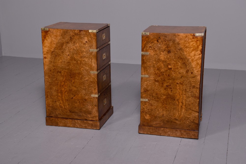 A pair of Victorian burr walnut military style small chests of drawers featuring flush brass handles, corner brackets, and four graduated drawers. View III
