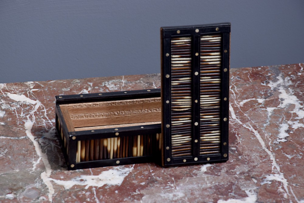 An Edwardian rectangular porcupine quill box with dark ebonised wooden framing and circular bone dot inlays. View II