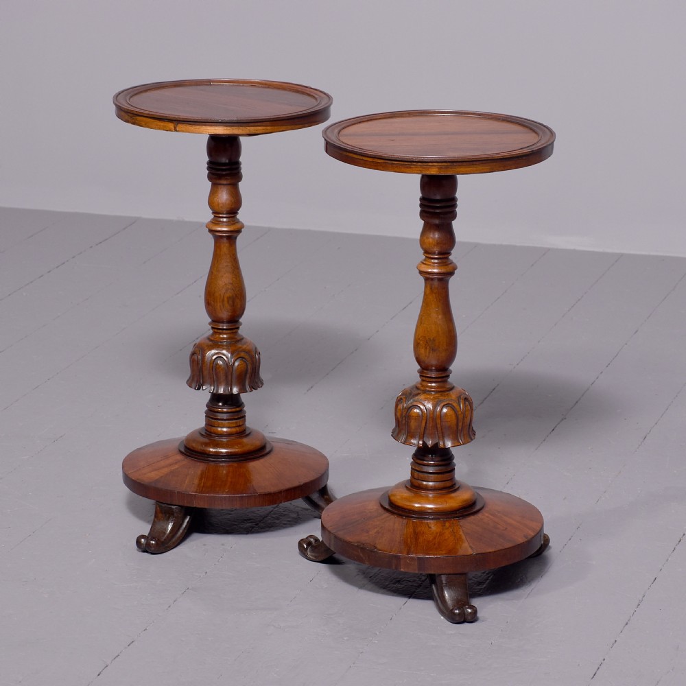 Pair of William IV rosewood wine or occasional tables on ring-turned supports over cabriole legs.