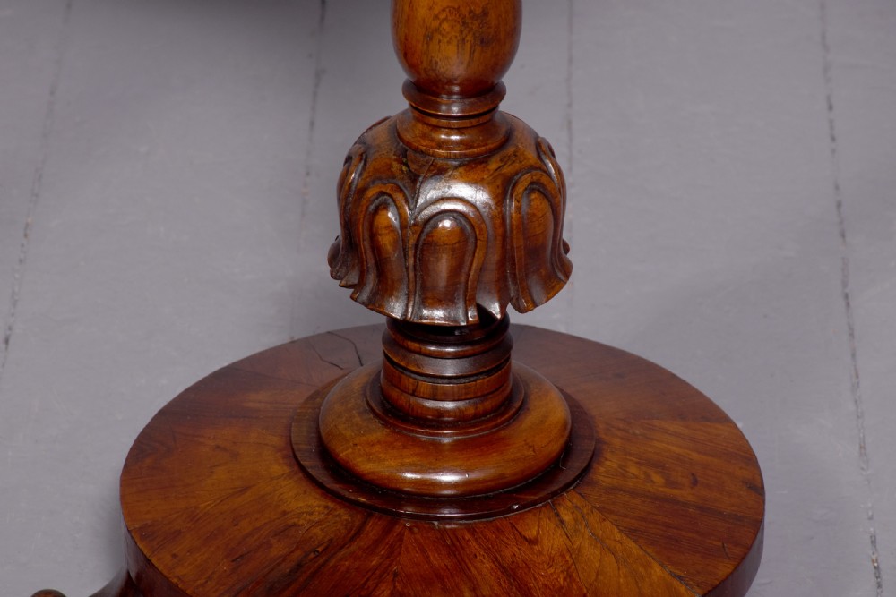 Pair of William IV rosewood wine or occasional tables on ring-turned supports over cabriole legs. View IV