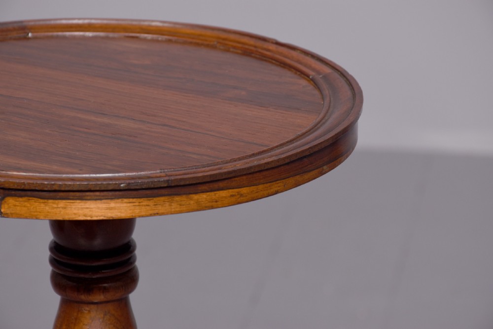 Pair of William IV rosewood wine or occasional tables on ring-turned supports over cabriole legs. View IX
