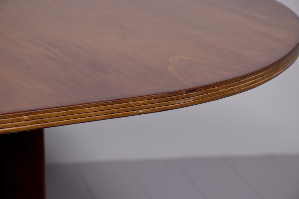 A mahogany twin pillar dining table featuring reeded splayed legs with brass castors and a polished wood finish. View IX